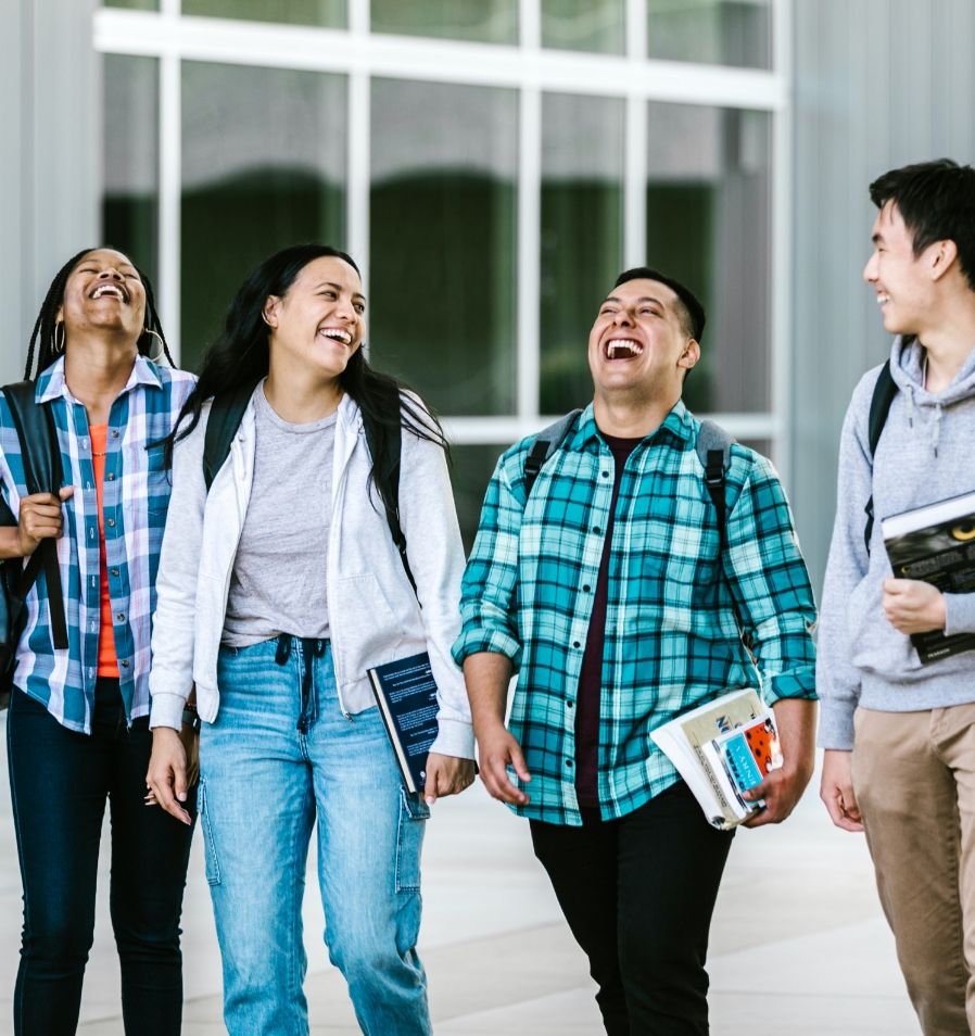 Verve Columbus luxury apartments- students laughing and walking together