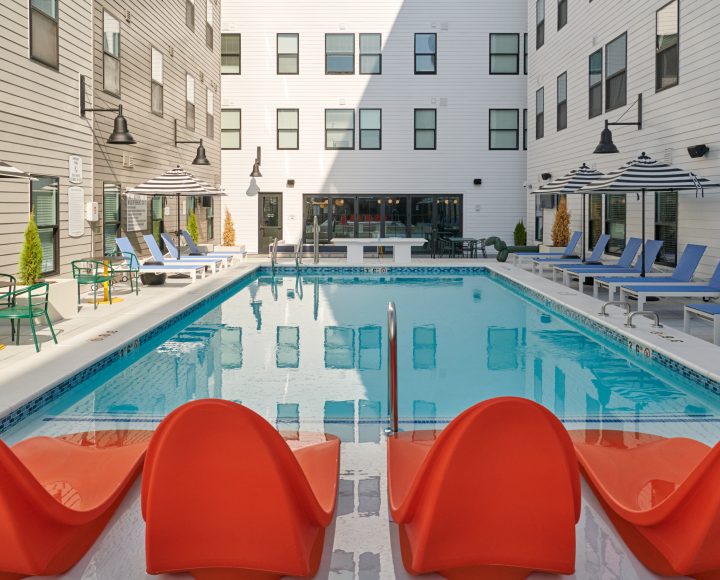 The Verve Columbus student apartments outdoor pool area with ping pong table