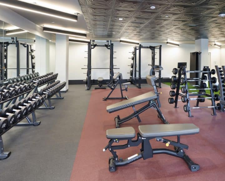 The Verve Columbus luxury student apartments fitness center with weights, suspension trainer, and punching bag